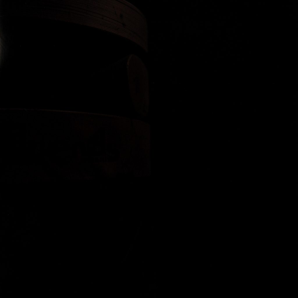 Books and Blends logo mark on a dark, moody background